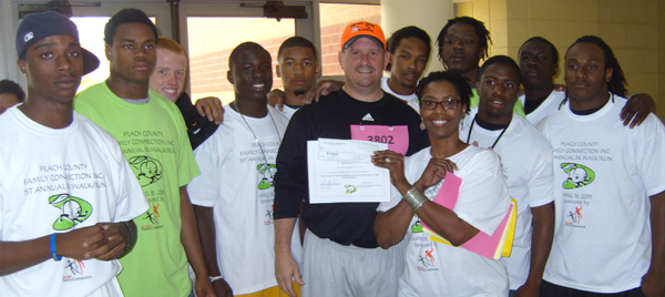 Peach County 5k football team volunteers Peach County 5k football team